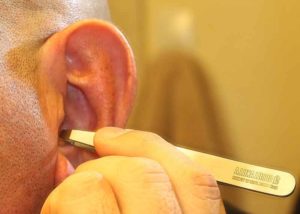 using tweezers to get rid of ear hair